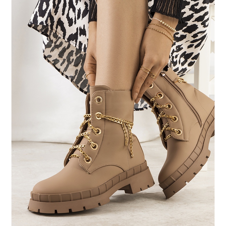 Brown hiking boots with Alcin chain 1