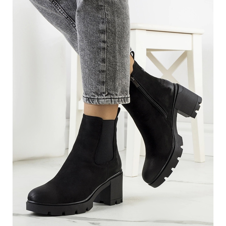 Black suede high-heeled boots from Svelte 1