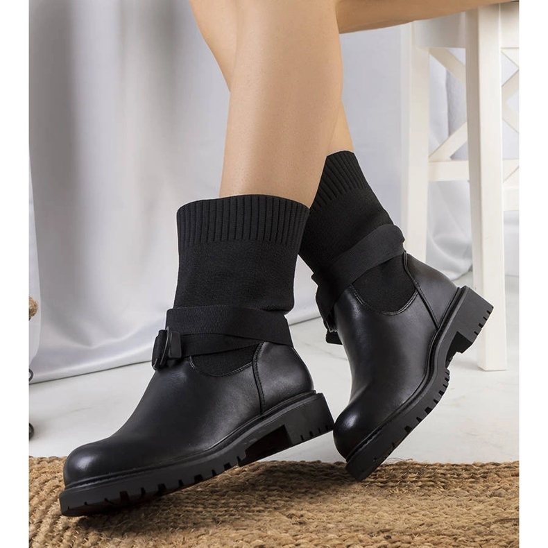 Black boots with a flexible Ricky upper 1