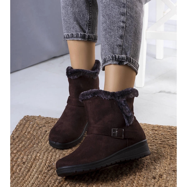 Brown insulated boots on a Capo wedge 1