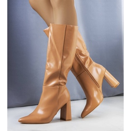 Beige boots on the Adair post 1