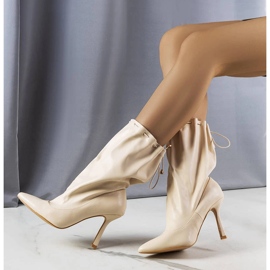 Annalize beige stiletto heel boots 1