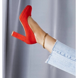Red heel pumps from Leonard 1