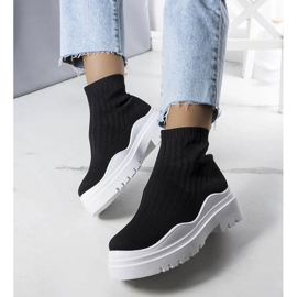 Cali black sock boots with a white sole 1