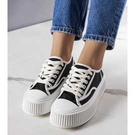 Black platform sneakers from Delores 1