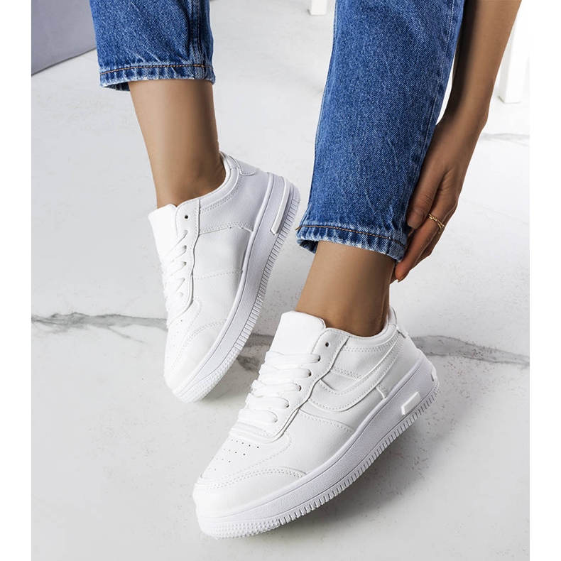 BM White sneakers on a thick sole from Kim 1