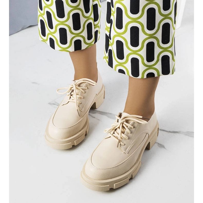 Beige shoes with a massive sole from Kay 1