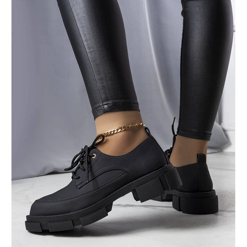 Black shoes with a massive sole from Kay 1