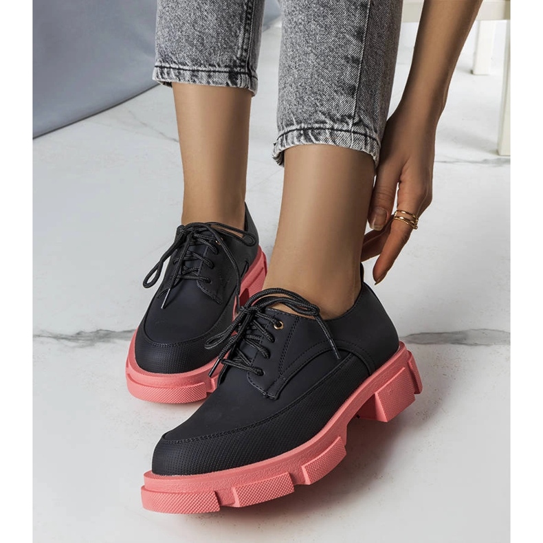 Black shoes with a massive sole from Kay 1