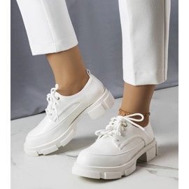 White shoes with a massive sole from Kay 1