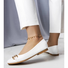 White ballerinas with gold Iris decoration 1