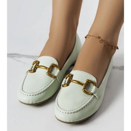 Green loafers with gold embellishment from Regina 1