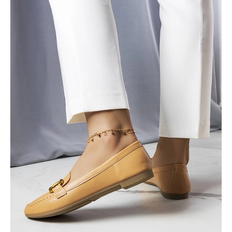 Beige loafers with gold embellishment from Regina 1