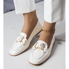 White patent leather loafers from Erica 1