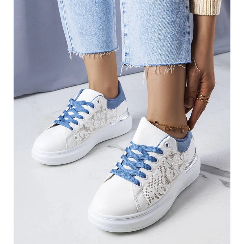 White and blue shoes decorated with perforations from Erin 1