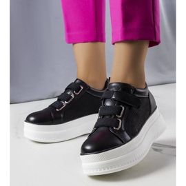 Black platform sneakers from Armina 1