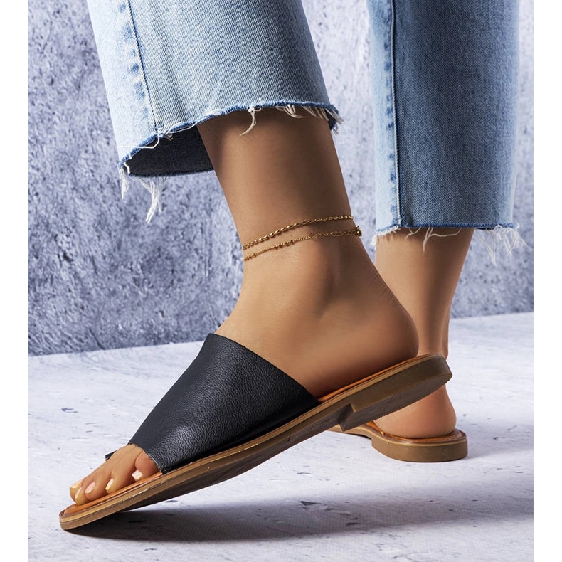 Black slippers with an irregular upper from Latourelle 1