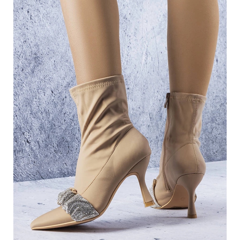 Beige boots decorated with rhinestones from Caisse 1 Beige boots decorated with rhinestones from Caisse 1