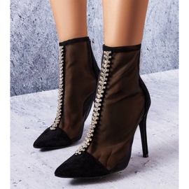 Black boots decorated with cubic zirconia from Veilleux 1