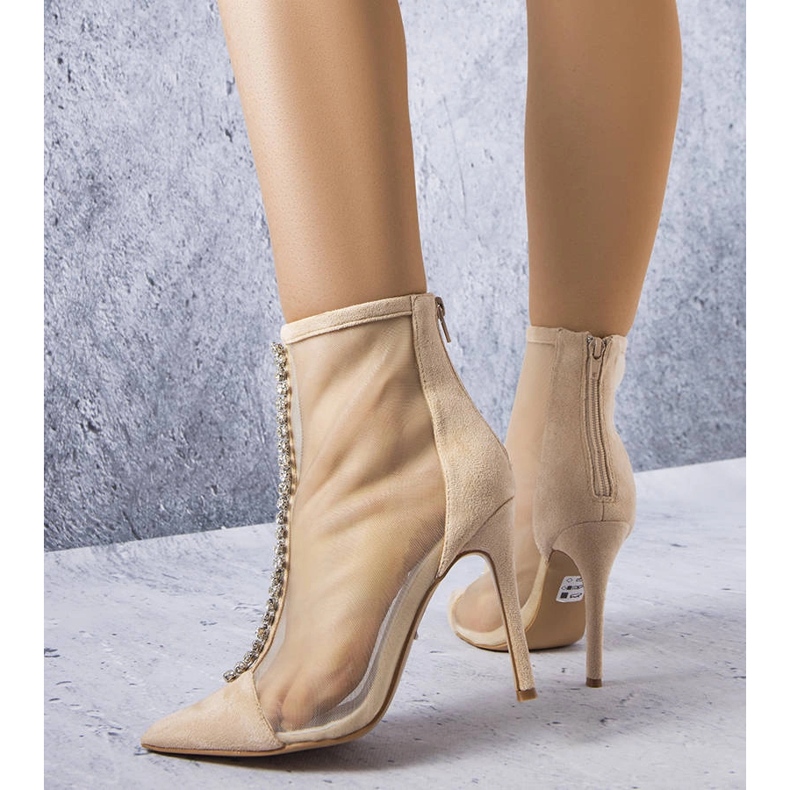 Beige boots decorated with cubic zirconias from Veilleux 1 Beige boots decorated with cubic zirconias from Veilleux 1