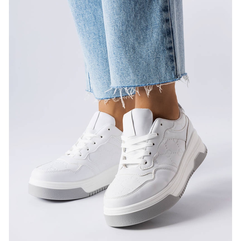White sneakers decorated with Pare embossing 1