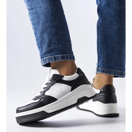 Black sneakers decorated with Paré embossing 1