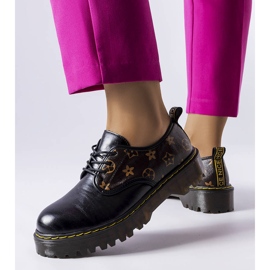 Eugenia black boots with brown inserts 1