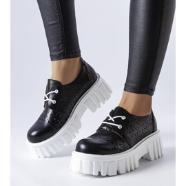 Black openwork massive shoes from Camus 1