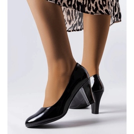 Burkett black patent leather pumps 1