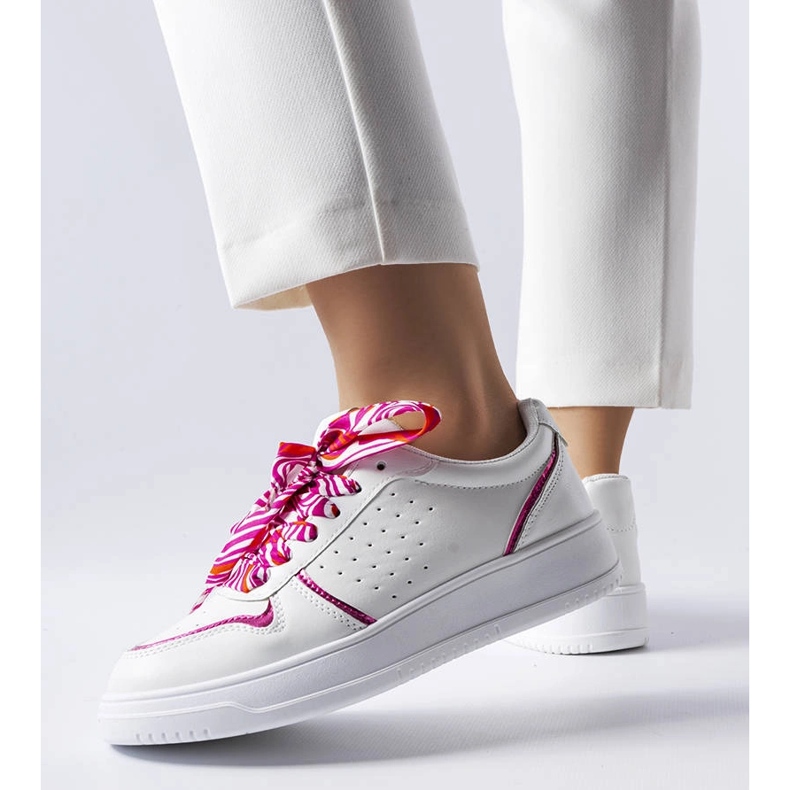 White sneakers tied with Pryor ribbon 1