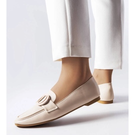 Beige buckle loafers from Poissonnier 1