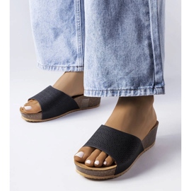 Black openwork wedge sliders from Bourque 1