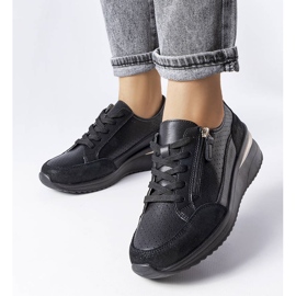 Black openwork leather shoes from Fleur 1