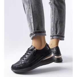 Black openwork leather shoes from Fleur 2