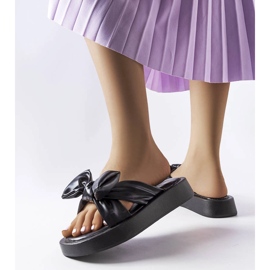 Black platform sandals with a bow from Edvard 1