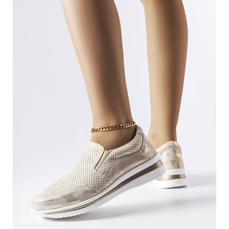 Gold openwork wedge sneakers from Rhéaume golden 1