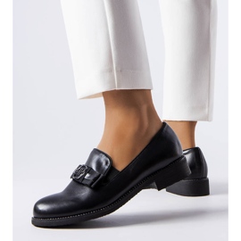 Black loafers decorated with a bow and rhinestones 1