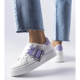 White sneakers decorated with a purple Ike buckle 1