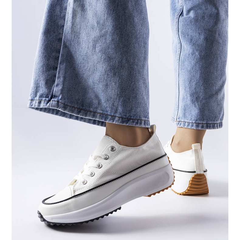 White sports sneakers on the McKeylor platform 1