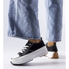 Black sports sneakers on the McKeylor platform 1