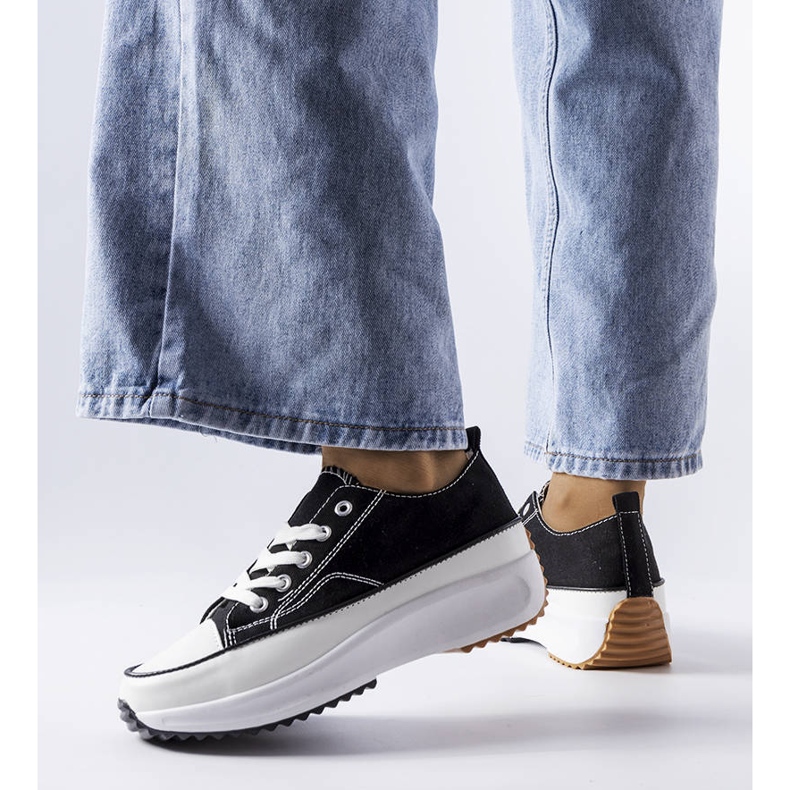 Black sports sneakers on the McKeylor platform 1