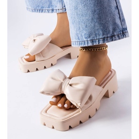 Beige tractor sole slides from Bossé 1