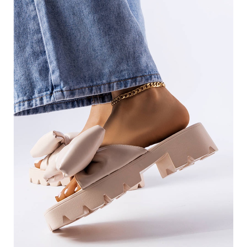 Beige tractor sole slides from Bossé 2