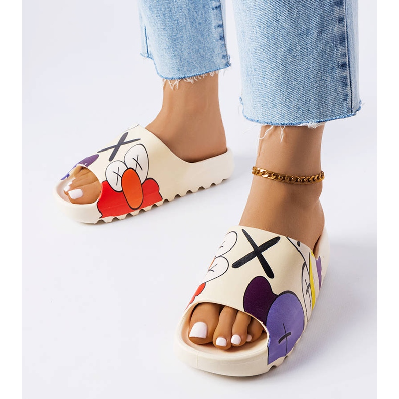 Beige slides with a tread and prints 1