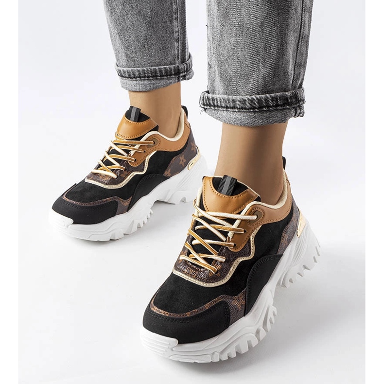 Black sneakers on an irregular sole from Alta 1