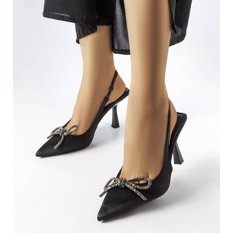 Black heels with a Wildrose bow 1