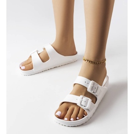 White rubber sliders with buckles from Eugene 1