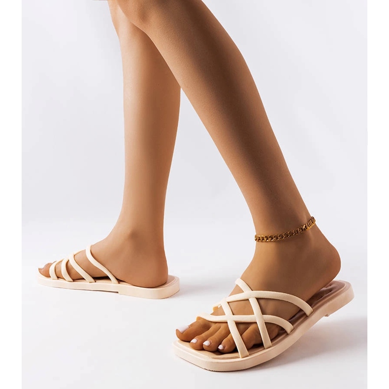 Pearlman beige rubber slides 1