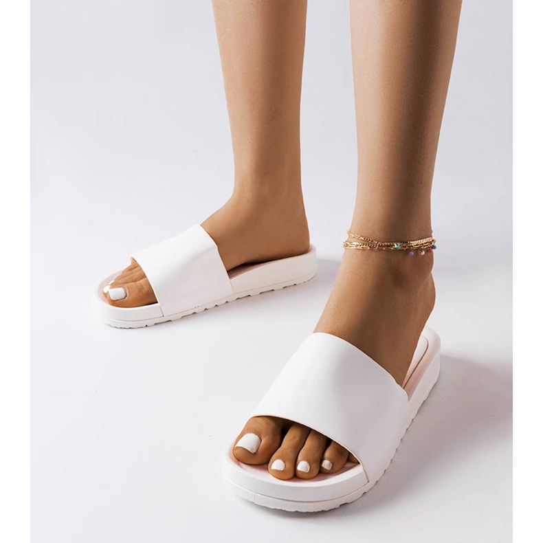 Inna White rubber slides from Sabourin 1