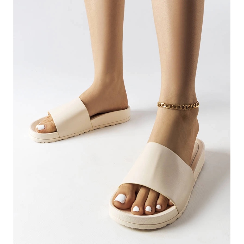 Beige rubber slides from Sabourin 1